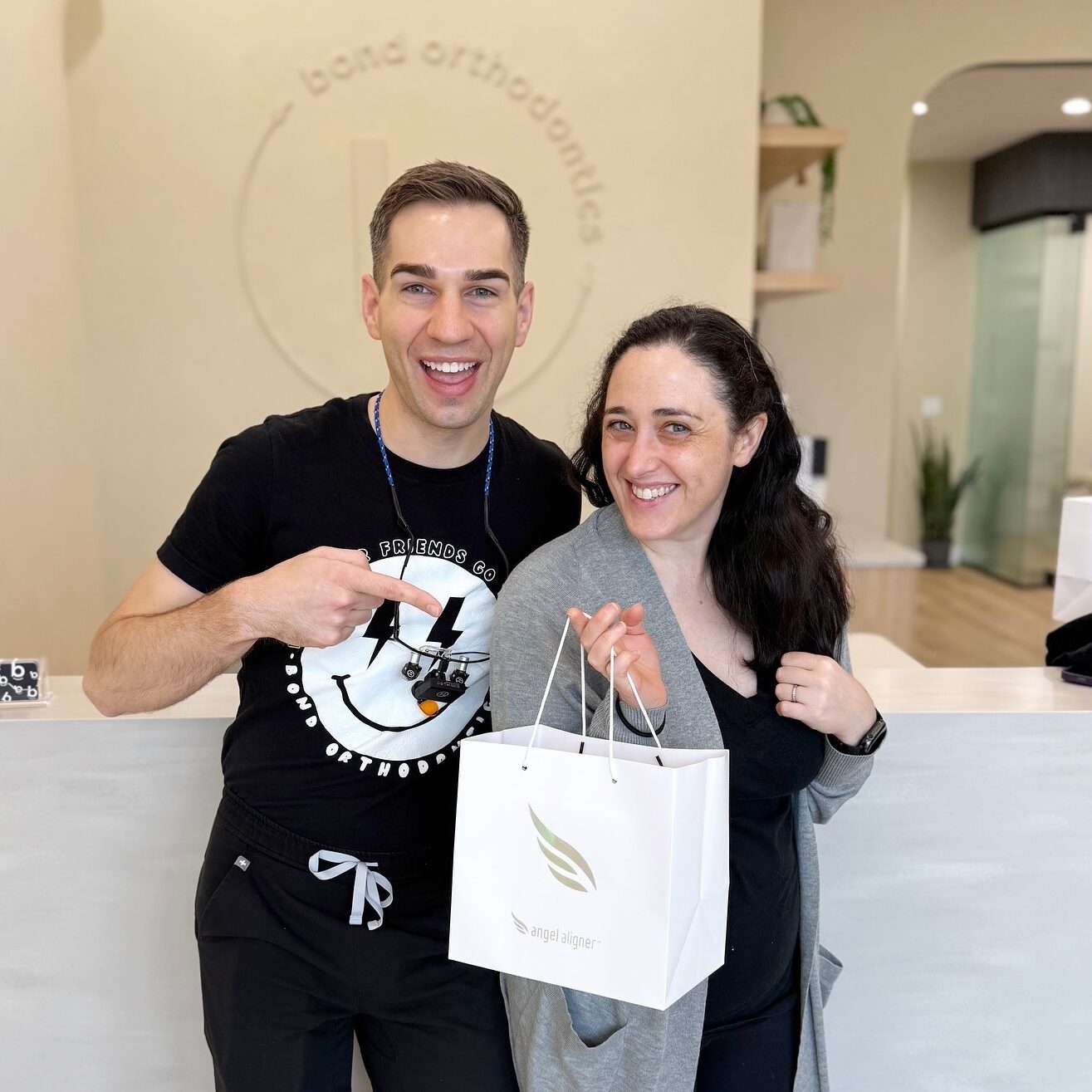 Dr. Charles Bond and a patient with clear aligners in Northbrook.